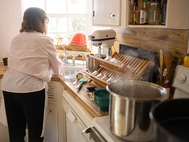 female kitchen pot steam