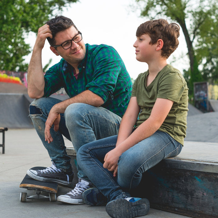 talking with teenager at skeitboard park