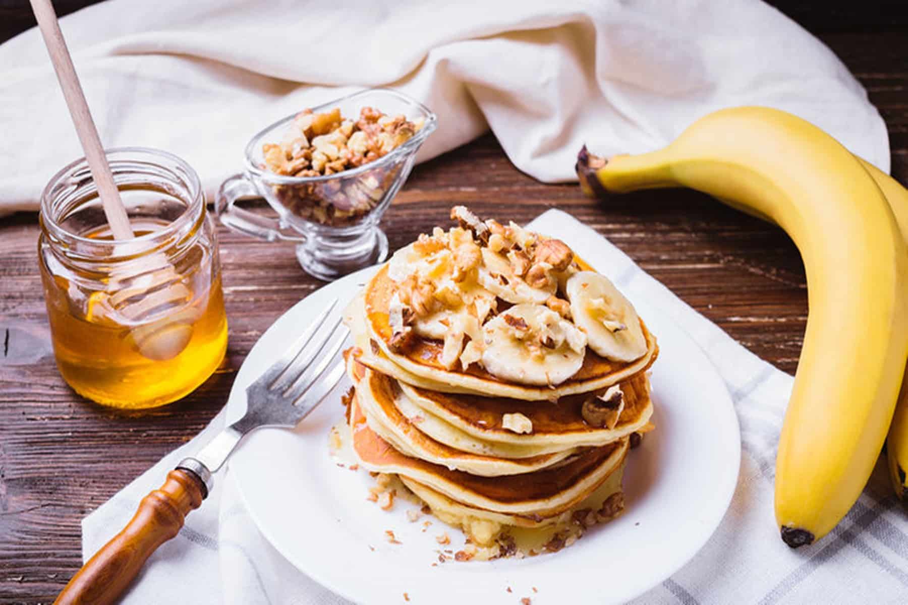 bigstock pancakes with banana walnuts 232673275