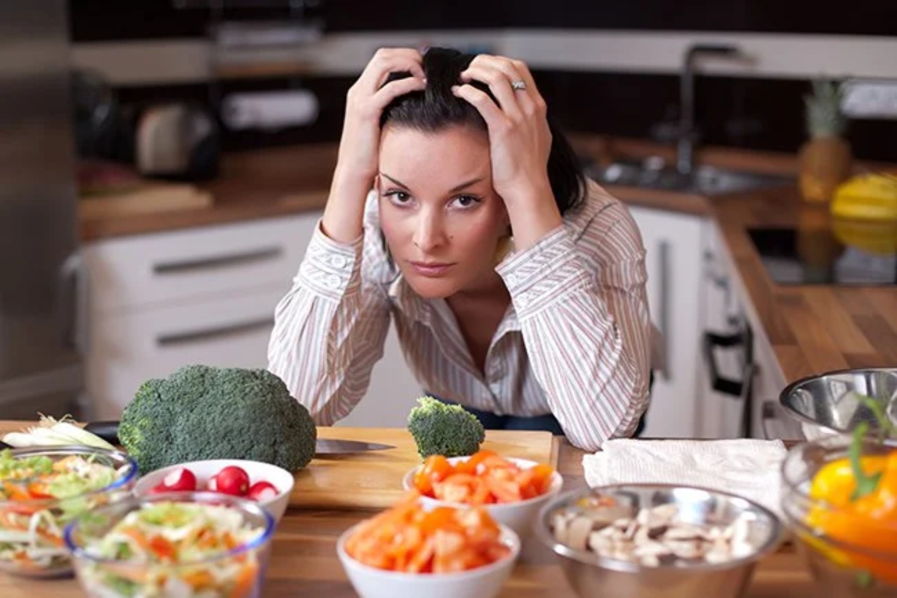 woman stressed food healthy eating vegetables diet